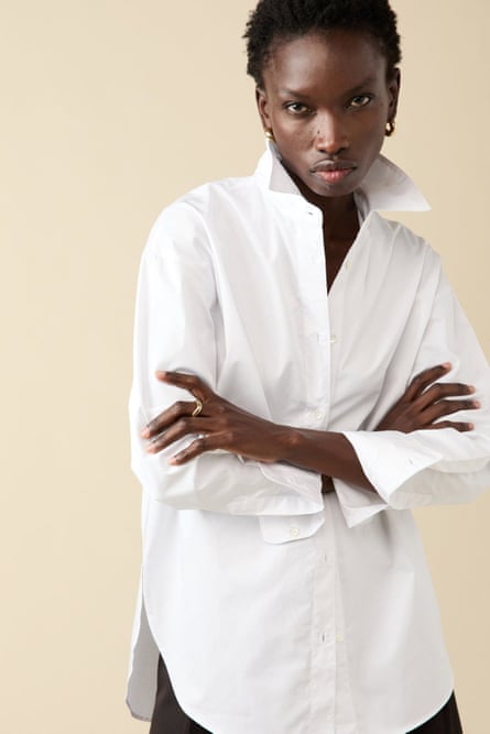 A model wearing The Everything Shirt in White