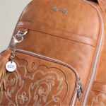 Itzy Ritzy Diaper Bag Backpack – Large Capacity Boss Plus Baby Backpack Diaper Bag Featuring 19 Pockets, Changing Pad, Stroller Clips, and Comfortable Straps (Saddle) - Image 6