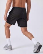 Real Essentials 3 Pack: Men's 2 in 1 Mesh 7" Running Workout Gym Shorts with Compression Liner (Available in Big & Tall) - Image 5