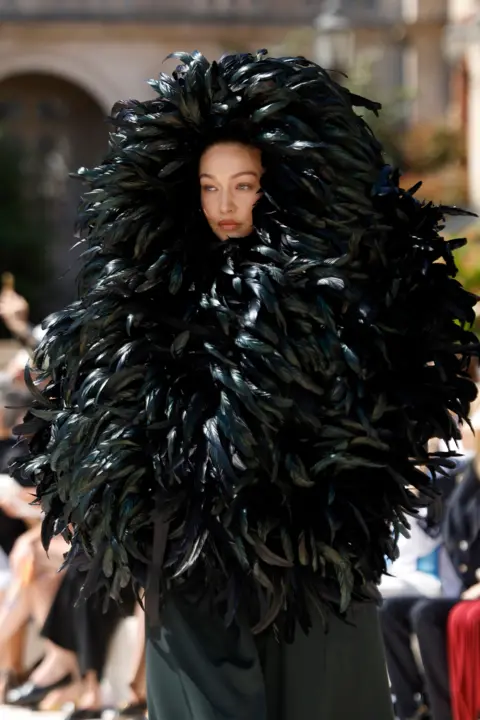 Estrop/Getty Images Gigi Hadid walks the runway during the Balenciaga Haute Couture Fall/Winter 2026/2027 show as part of Paris Fashion Week on July 8, 2026 in Paris, France.