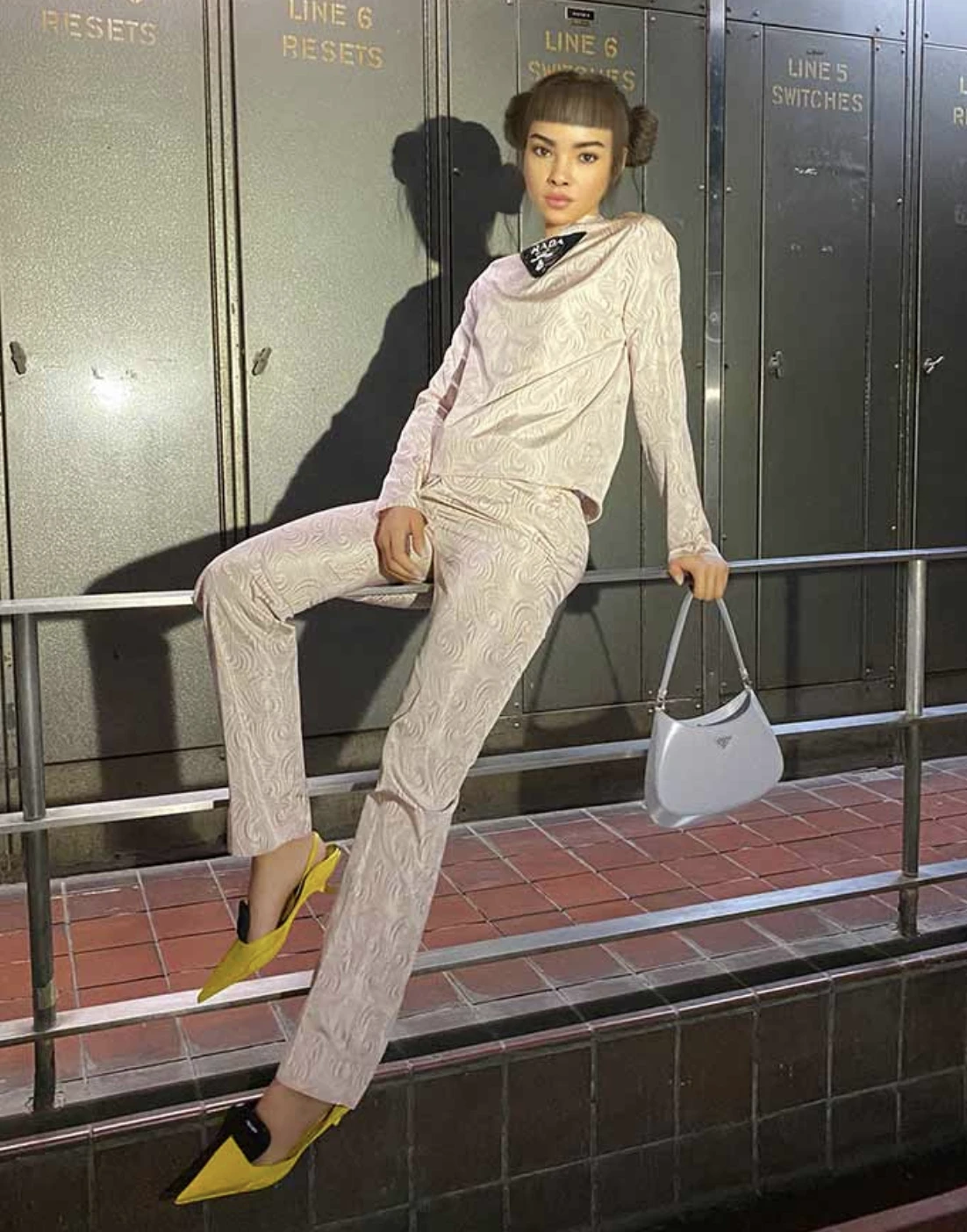 Lil Miquela attending a fashion event by Prada