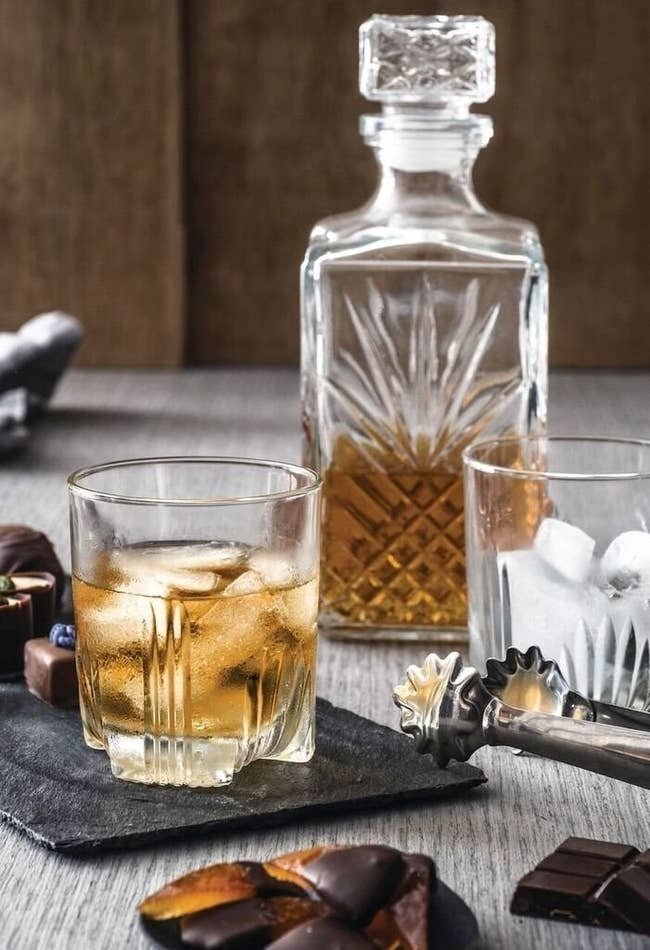The crystal decanter with rocks glass