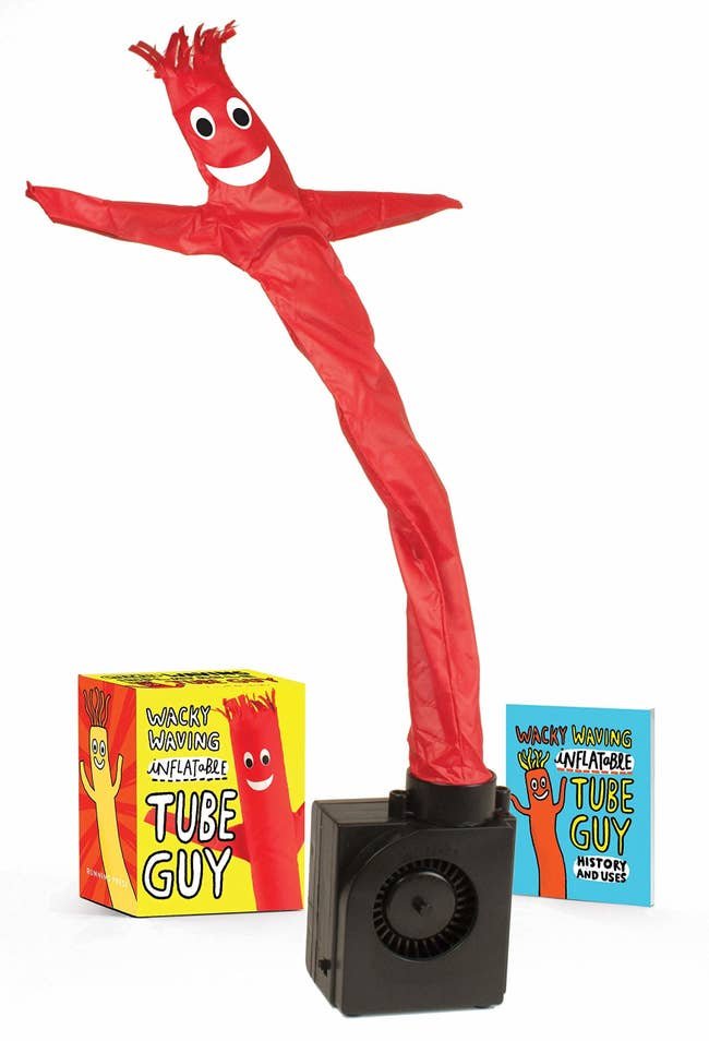 The red guy with box and booklet