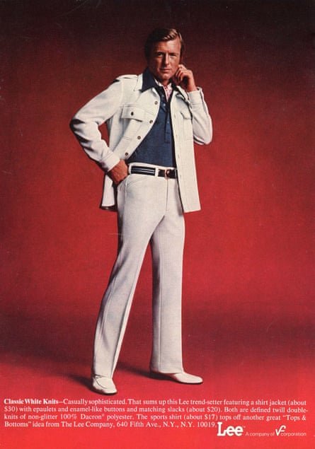 A man in an advertisement shows off a white jacket and pants set.