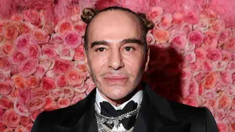 Getty Images John Galliano attends The 2019 Met Gala Celebrating Camp: Notes on Fashion at Metropolitan Museum of Art on May 06, 2019 in New York City
