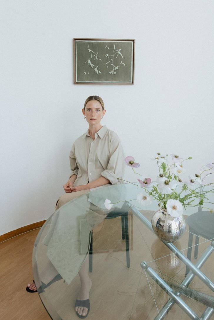 A campaign image from women's fashion brand The Aperture's 2026 fall collection features a classic shirt and H-line skirts. Courtesy of Samsung C&T Fashion Group