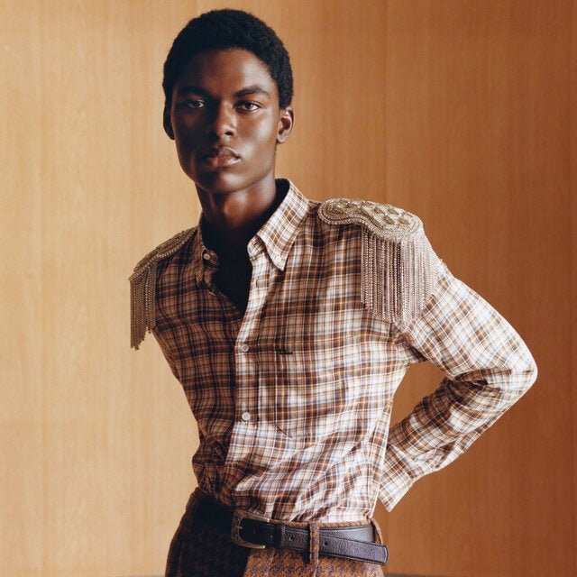 Dior shirt and pants, dior.com; and stylist’s own belt.