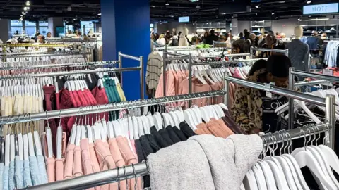 Gamma-Rapho via Getty Images The interior of the first physical Shein store at the BHV Marais department store on November 10, 2025 in Paris, France