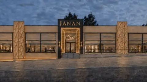 Janan/Bradford Council An artist's impression of the new Janan store. It is gold and grey with lights at the front.